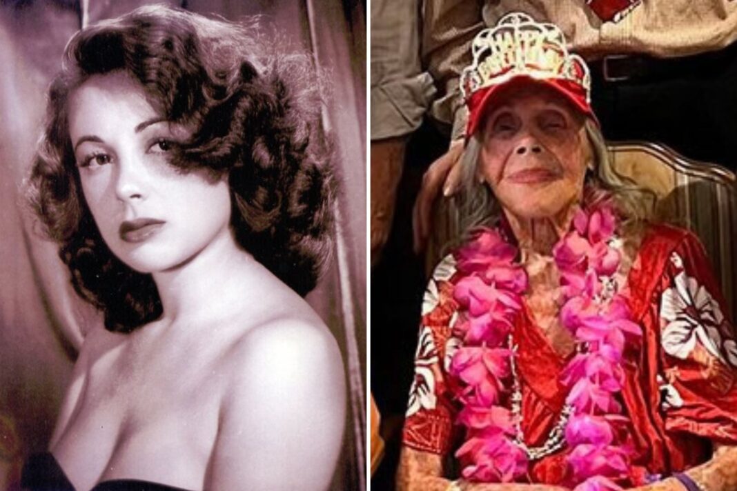 Caren Marsh Doll sonríe con una gorra de cumpleaños roja y una tiara, celebrando sus 107 años.