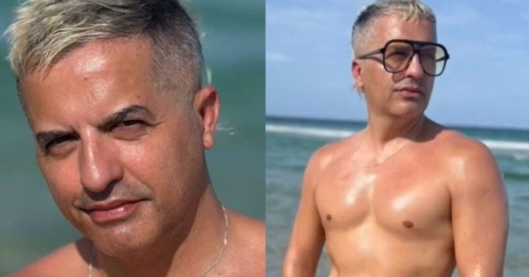 Ángel De Brito en la playa de Miami con torso desnudo