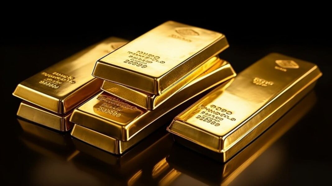 Lingotes de oro sobre superficie reflectante