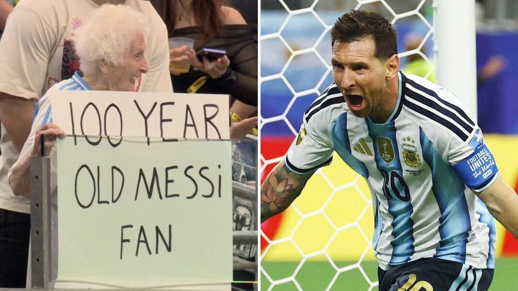 Pauline Kana sosteniendo un cartel que dice '100 Year Old Messi Fan' en las tribunas del Mundial 2026