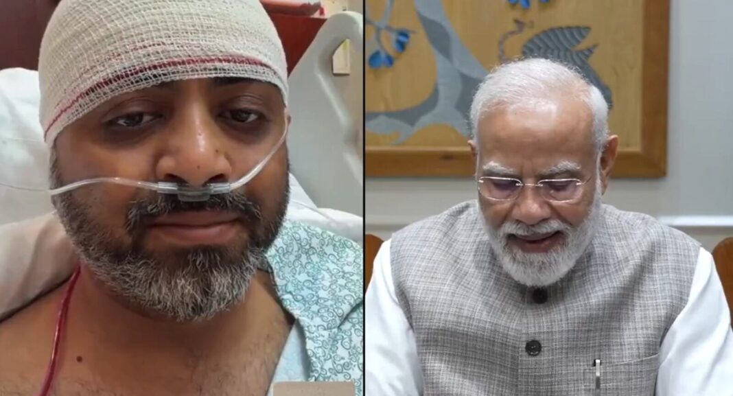 Smit Machchhar, piloto herido del vuelo FZ 1073 de Flydubai, con una venda en la cabeza durante una videollamada con Narendra Modi